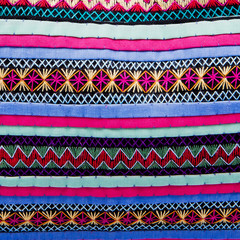 Colorful african peruvian style rug surface close up. More of th