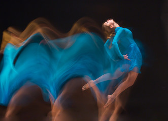 The art photo-emotional dance of beautiful blue woman