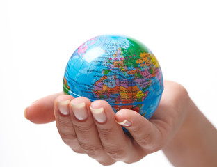 woman's hand with globe