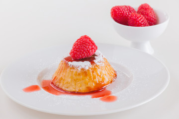 Vanilla rice pudding with raspberry sauce