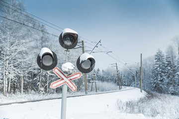 Snow covered railway crossing