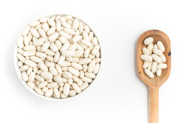  White beans into a bowl and spoon in white background. Phaseolu