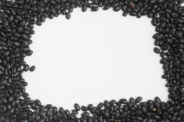 Black beans frame in white background. Phaseolus vulgaris 'Black