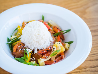 chicken in teriyaki sauce with rice and vegetables