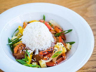 chicken in teriyaki sauce with rice and vegetables