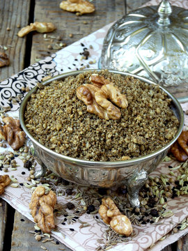 Egyptian spice blend Dukkah nuts, black pepper, coriander, fennel, cumin and other spices - selective focus