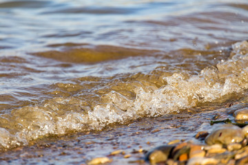 wave on the shore as the background