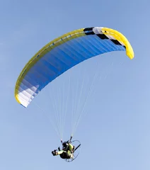 Tuinposter parachute on a sky background © schankz