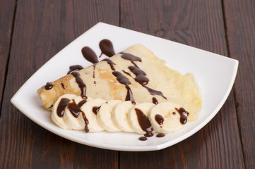 Crepes with bananas and cream