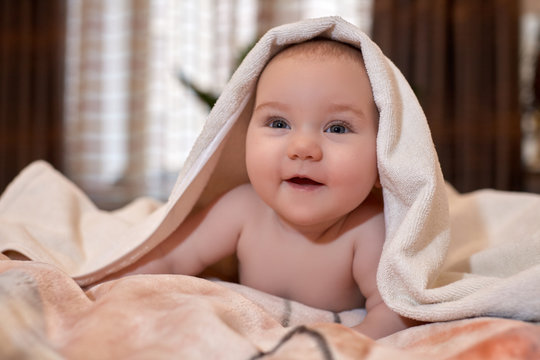 Sweet small baby with  towel