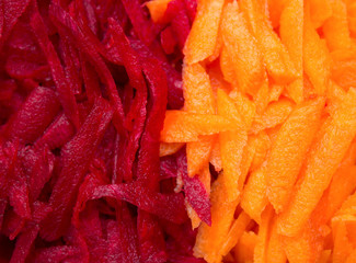 The concept of healthy eating. Shredded carrots and beets