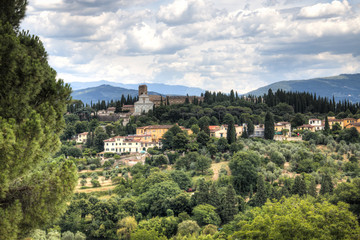 Fototapeta na wymiar Tuscany landscape with some houses seen from piazzale Michelangelo in Florence, Italy 