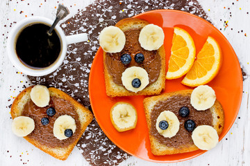 Funny breakfast for children toast with chocolate