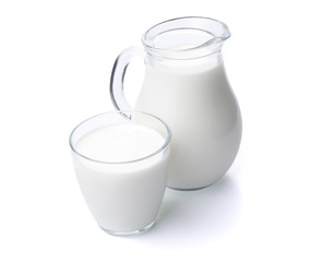 Milk in a glass jug isolated with clipping path.