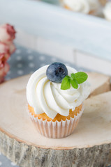 Summer cupcakes with blueberries and mint flavoured cream. Homemade.
