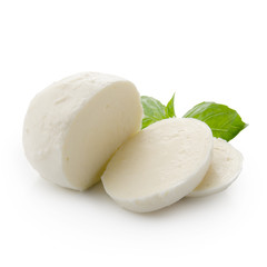 Piece of white mozzarella isolated on white background with clipping path. Decorated with basil. Front view. - obrazy, fototapety, plakaty