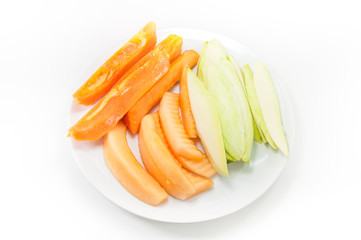 Fototapeta na wymiar fruit papaya mango and cantaloupe on dish on white background
