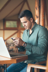 Young man using mobile phone