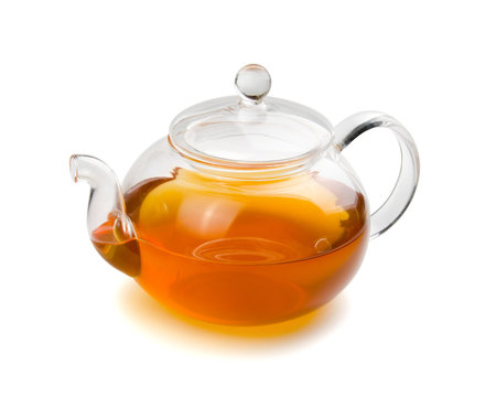 Teapot glass with tea isolated on white background with clipping path. Front view.