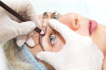Naklejka premium Mikrobleyding eyebrows workflow in a beauty salon