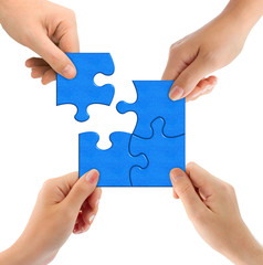 Hands and puzzle