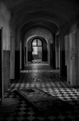Dark spooky corridor in an old abandoned hospital building