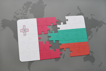 puzzle with the national flag of malta and bulgaria on a world map background.