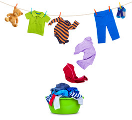 clothing falls from laundry line in wash bowl on white backgroun