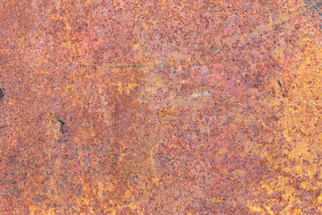 A background of peeling paint and rusty old metal