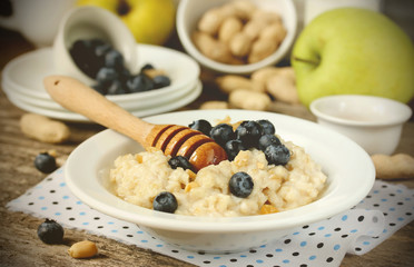 Delicious and healthy breakfast of oatmeal with fresh berries