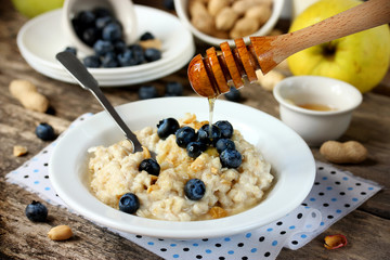 Delicious and healthy breakfast of oatmeal with fresh berries