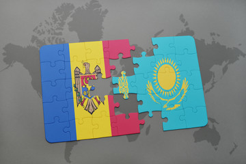 puzzle with the national flag of moldova and kazakhstan on a world map background.
