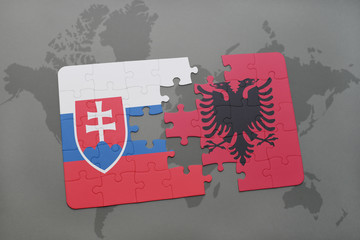 puzzle with the national flag of slovakia and albania on a world map background.