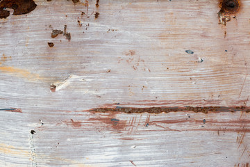 A background of peeling paint and rusty old metal