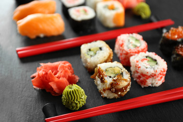 Sushi set and chopsticks on slate plate