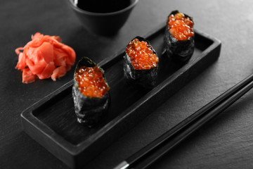 Sushi roll set on dark background
