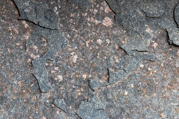 A background of peeling paint and rusty old metal