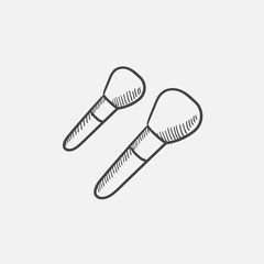 Makeup brushes sketch icon.
