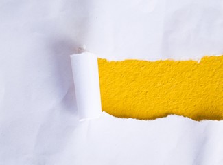 Torn paper with yellow background