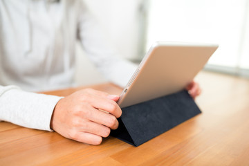 Woman using tablet computer
