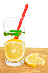 Close up image of fresh lemon slice in soda.
