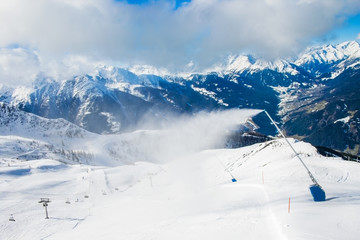 Snow machine in mountain ski resort Kals-Matrei, Austria.