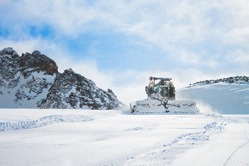Snow grooming machine in ski resort Molltaler Glacier, Austria.