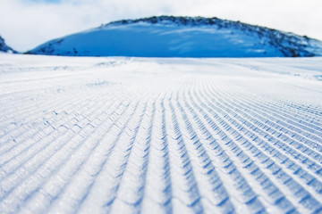 Freshly groomed ski slope in Molltaler Glacier ski resort, Austria.