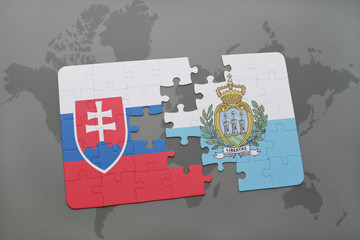 puzzle with the national flag of slovakia and san marino on a world map background.