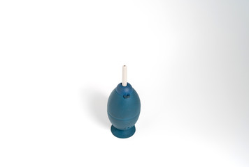 Silicone or Rubber Air Blower pump dust cleaner camera and lenses isolated on white background
