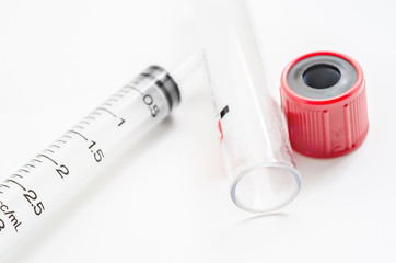 Syringe and Blank blood tube.