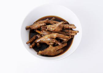 Delicious Chinese Cooked Chicken Feet on white backgrounds