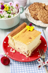 Piece of cheese cake and crunchy biscuits.