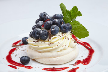Meringue cake Pavlova with blueberry